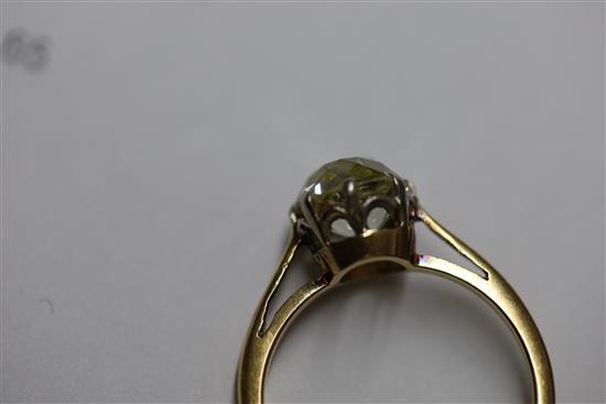 A gold and old mine cut solitaire diamond ring, size O/P.